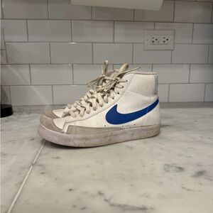 Nike White High-Top Sneakers with Blue Swoosh